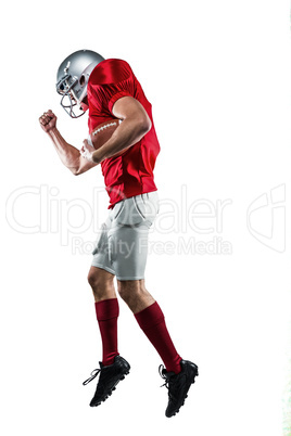 American football player in mid-air
