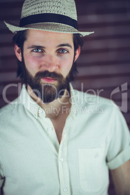 Portrait of confident man wearing hat