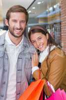 Young couple smiling while looking at the camera