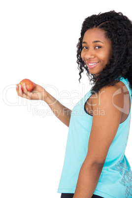 Model holding a red apple