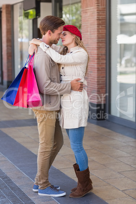 Happy smiling couple about to kiss