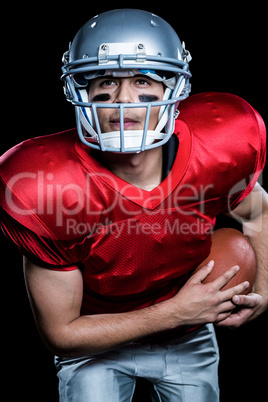 American football player with ball