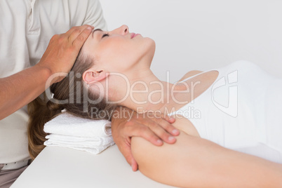 Woman receiving neck massage