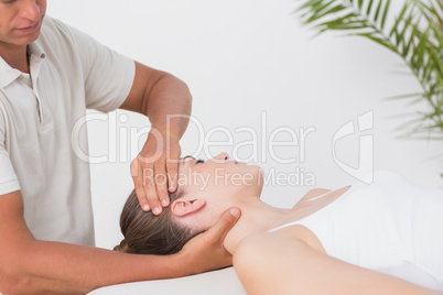 Woman receiving neck massage