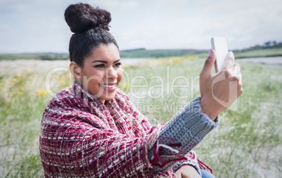 Beautiful woman using her smartphone