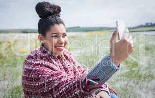 Beautiful woman using her smartphone