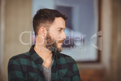 Creative businessman looking away Creative businessman looking away