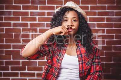 Hipster with mustache on finger