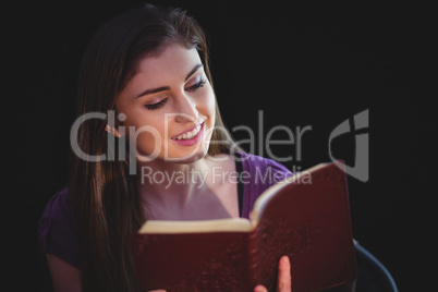 Woman praying with her bible