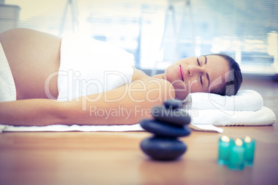 Pregnant woman sleeping in spa