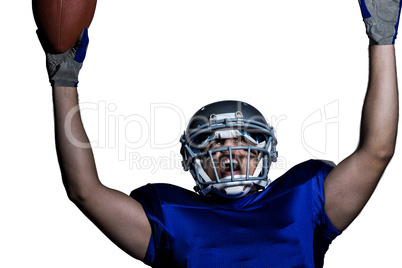 American football player in uniform cheering