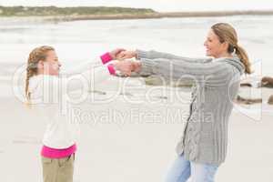 Mother and daughter playing together