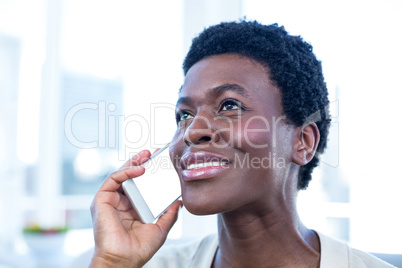 Woman with mobile phone at home