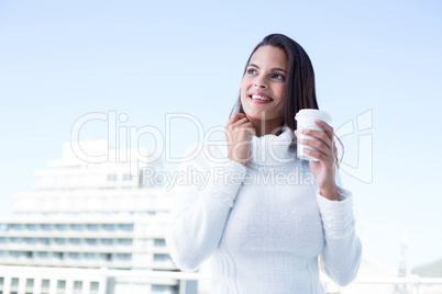 Beautiful brunette drinking a coffee