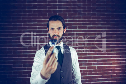 Serious man holding razor