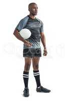 Sportsman with rugby ball standing