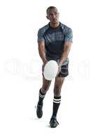 Athlete throwing rugby ball
