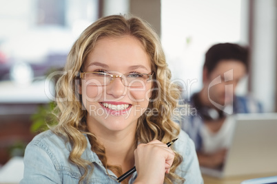 Portrait of businesswoman wearing eye glasses in ofiice