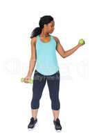 Woman exercising using dumbbells