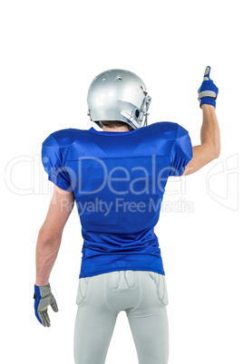 Rear view of sports player pointing