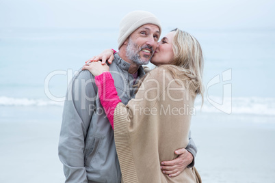 Cute couple standing and holding each other