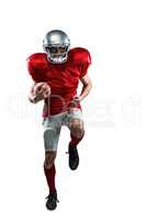 Full length portrait of American football player running