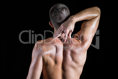 Shirtless man with neck pain