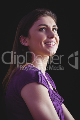 Woman smiling and looking up