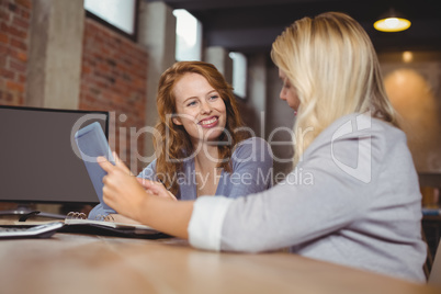 Business people smiling during interaction