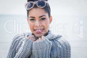 Attractive woman wearing a warm cardigan