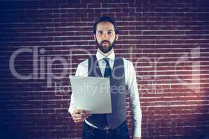 Portrait of confident man holding document