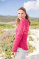 Smiling woman wearing a lovely pink top