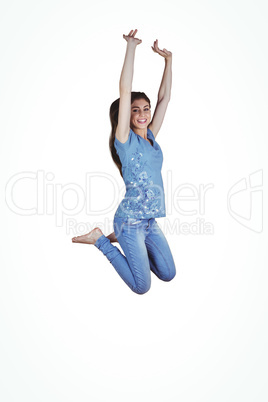 Pretty brunette jumping and smiling