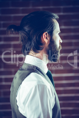 A Side view of a bearded man