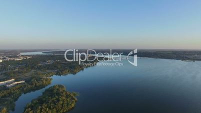 Flying Over The River at Sunset. Aerial Survey