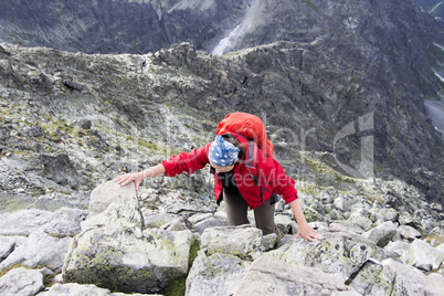 Girl on the top of mountain