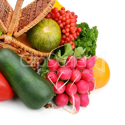 vegetables and fruits in a basket isolated on white background