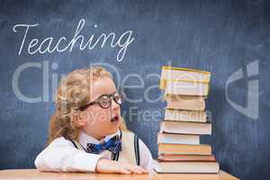 Teaching against blue chalkboard