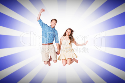 Composite image of cheerful young couple jumping