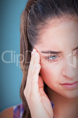 Composite image of close-up of beautiful woman suffering from he