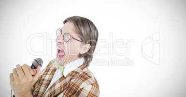 Composite image of happy geeky hipster singing with microphone