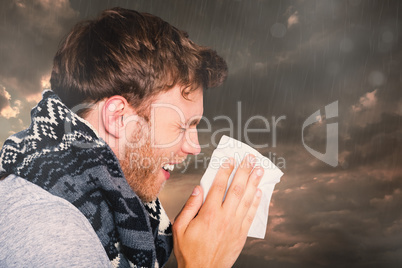 Composite image of close up side view of man blowing nose