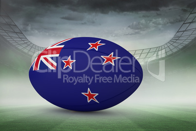 Composite image of new zealand flag rugby ball