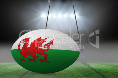 Composite image of welsh flag rugby ball