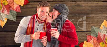 Composite image of couple both having warm drinks