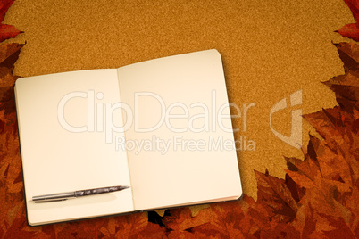 Composite image of notebook and pen