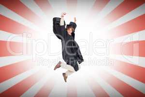 Composite image of happy male student in graduate robe jumping