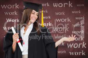 Composite image of a woman holding her hand out with a degree in