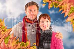 Composite image of couple holding each other
