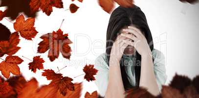 Composite image of troubled woman crying